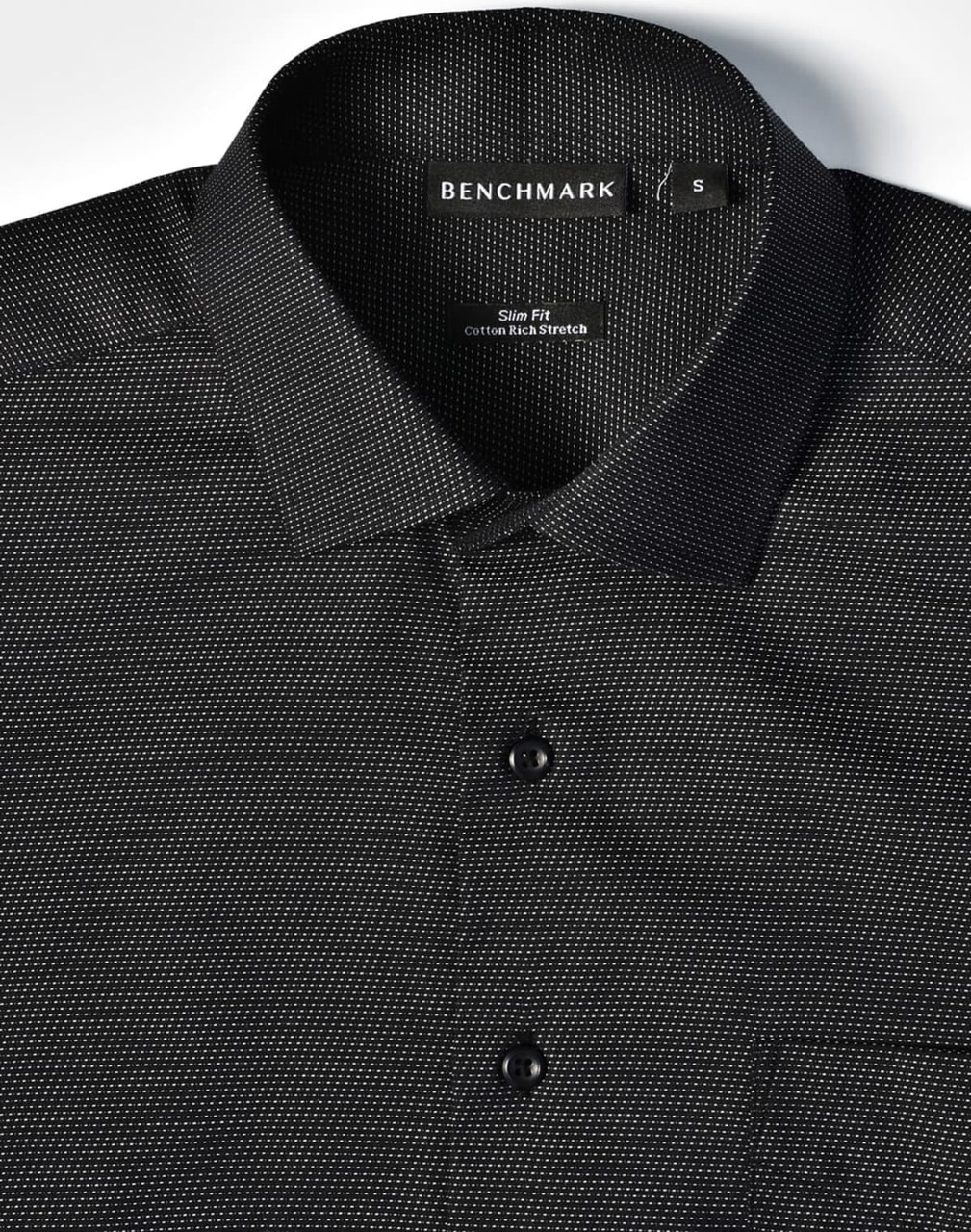 A black pin dot short-sleeve button-up shirt featuring a collar, buttons, and a pocket, with a logo on the label.