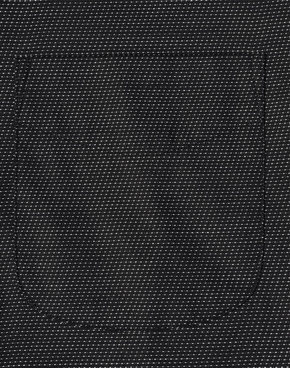 A black pin dot fabric with a pocket detail. The texture features small, contrasting dots.