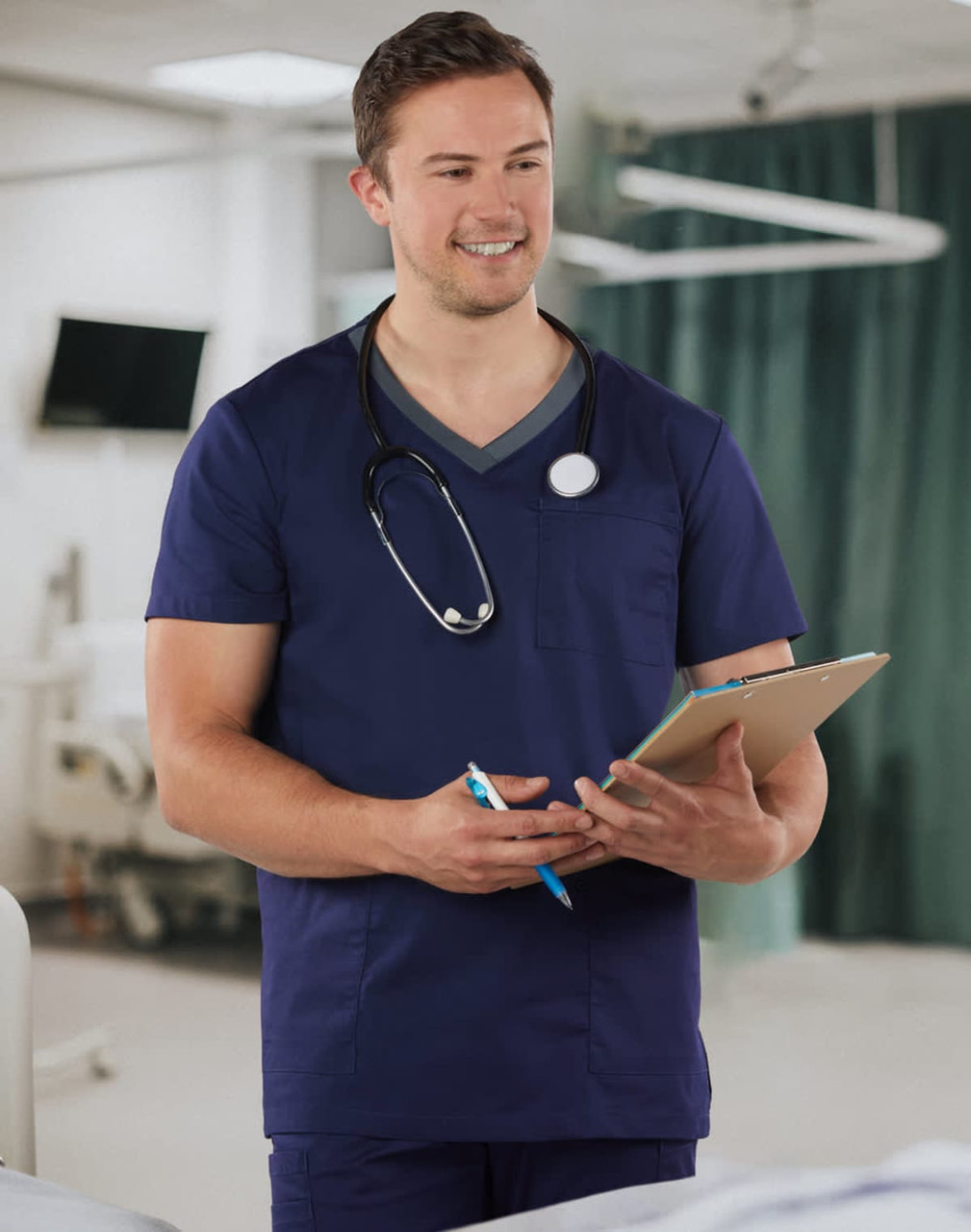 A men's short-sleeve scrub top in navy blue with a contrast colour neckline and a pocket, featuring a stethoscope.