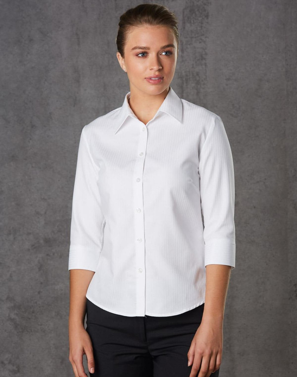 A white women's mini herringbone 3/4 sleeve button-up shirt with a collared neckline and a subtle pattern.