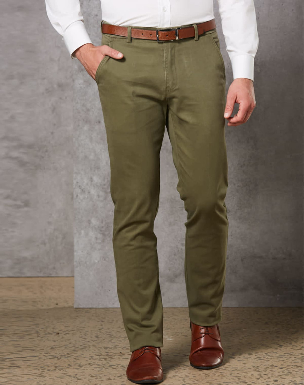 Men's Boston Chino Pants in olive green, featuring a slim fit and pockets, paired with a brown belt and shoes.