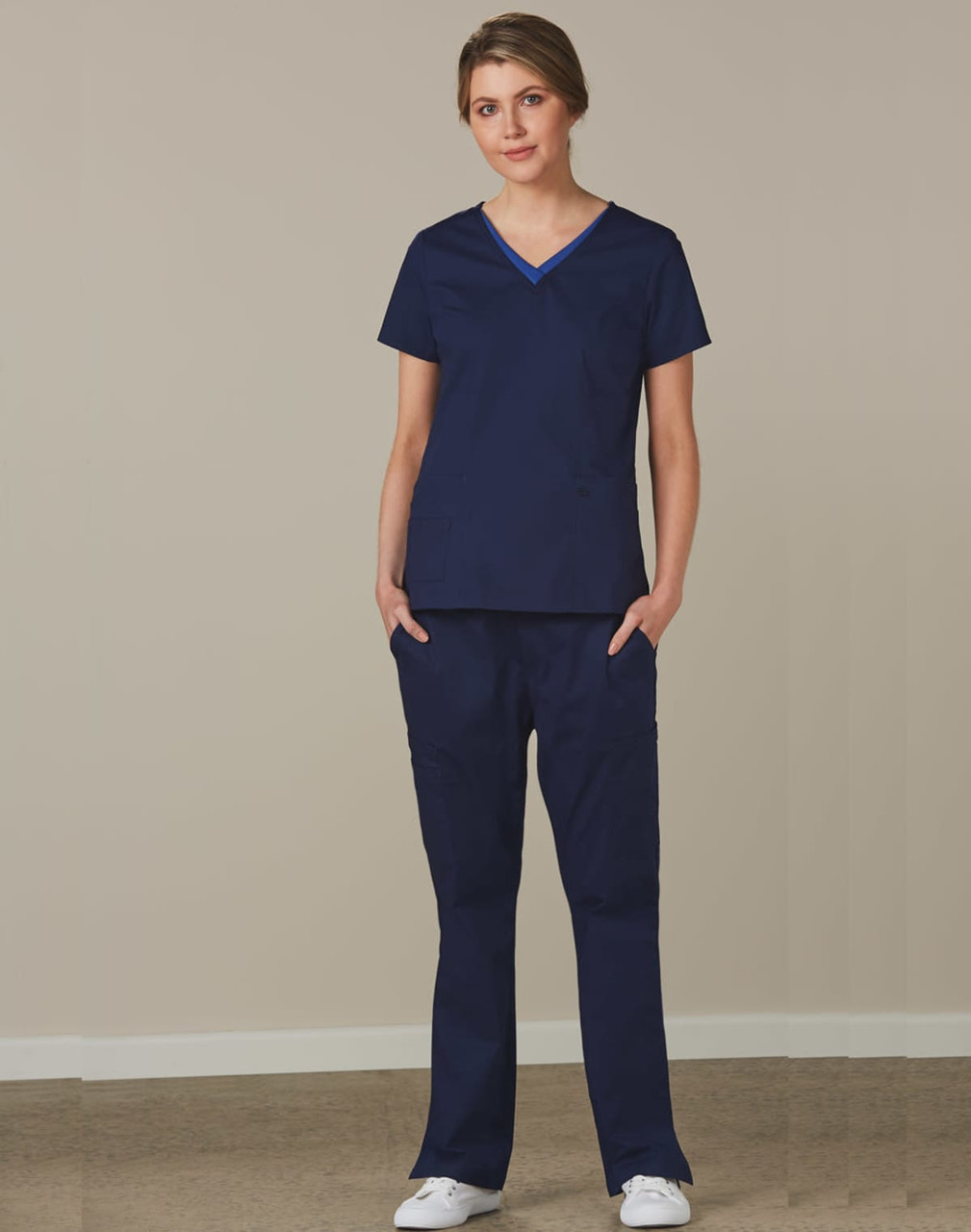 Navy solid colour scrub pants paired with a navy scrub top, featuring a simple design and pockets.