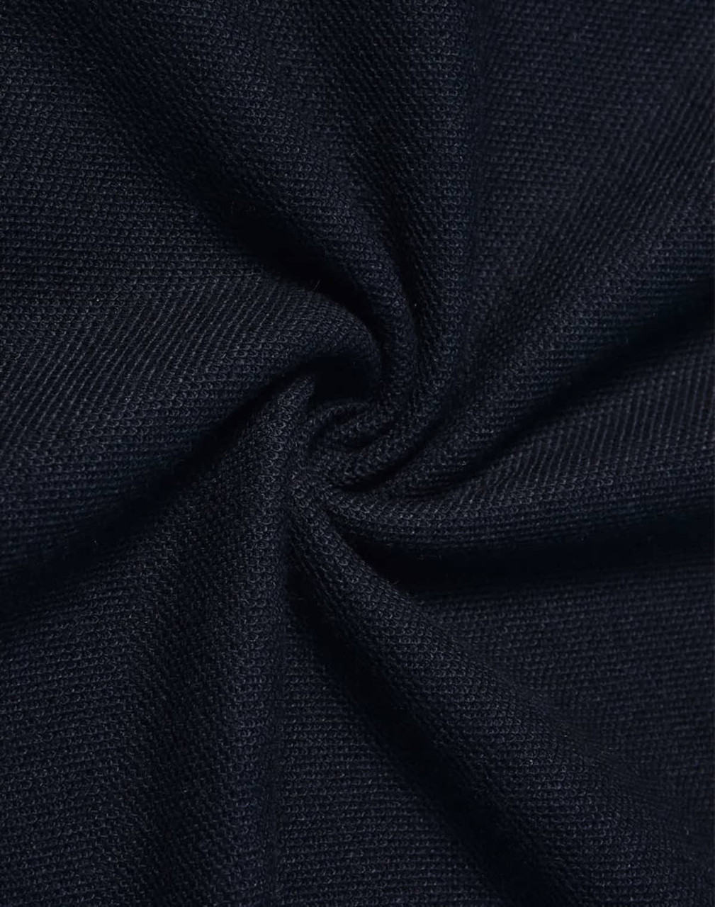 A close-up of dark navy fabric, showcasing a textured, woven pattern.