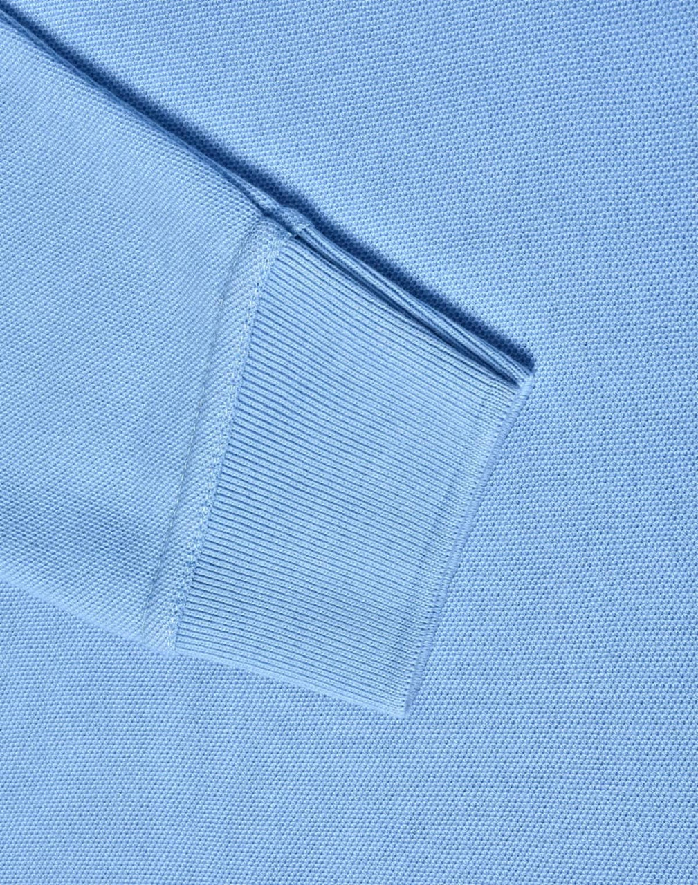 A light blue long sleeve polo shirt made from poly/cotton pique knit, featuring ribbed cuffs.