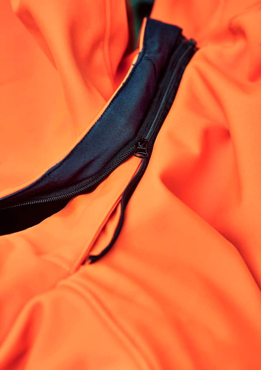 An orange Antarctic softshell jacket featuring a black zip and smooth fabric texture. Includes a logo detail.