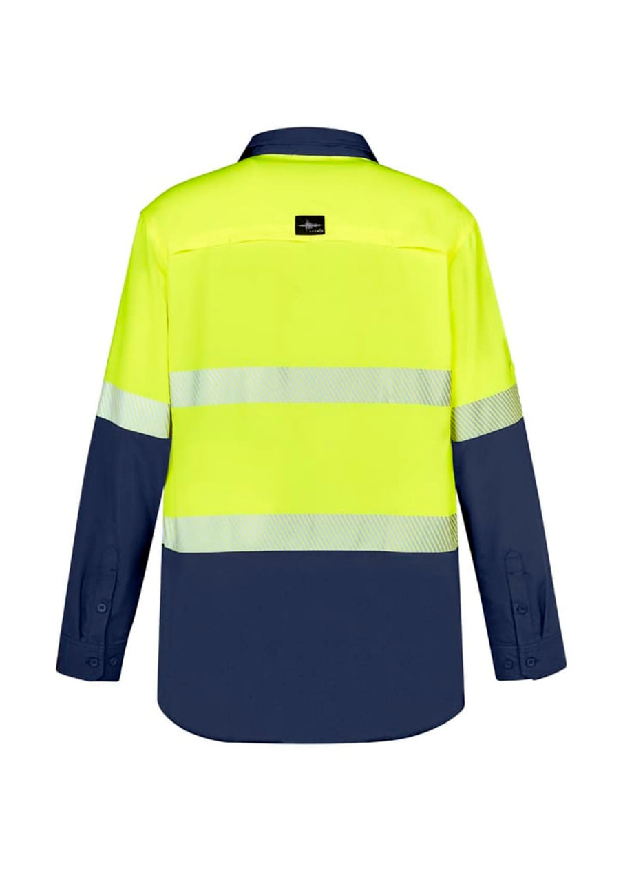 A long sleeve work shirt in hi-vis yellow and navy, featuring reflective segmented tape and a brand label.