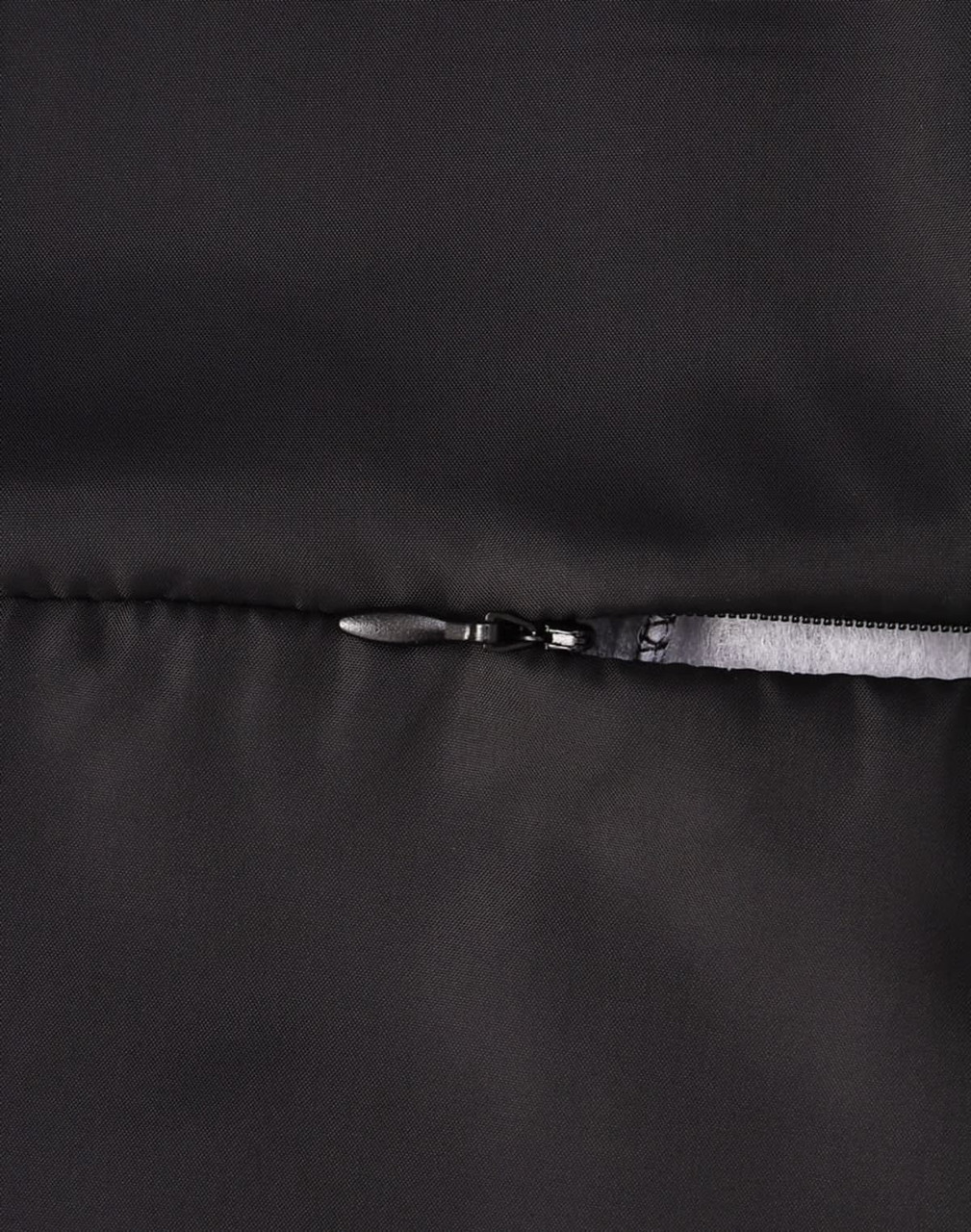 A black insulated puffer jacket featuring a sleek zipper detail. The fabric has a smooth texture and a modern design.