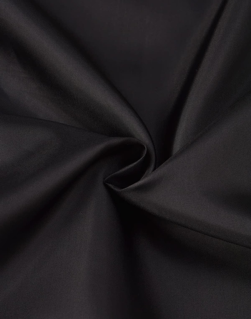 A close-up of black fabric with a smooth texture, showcasing its sheen and drape.