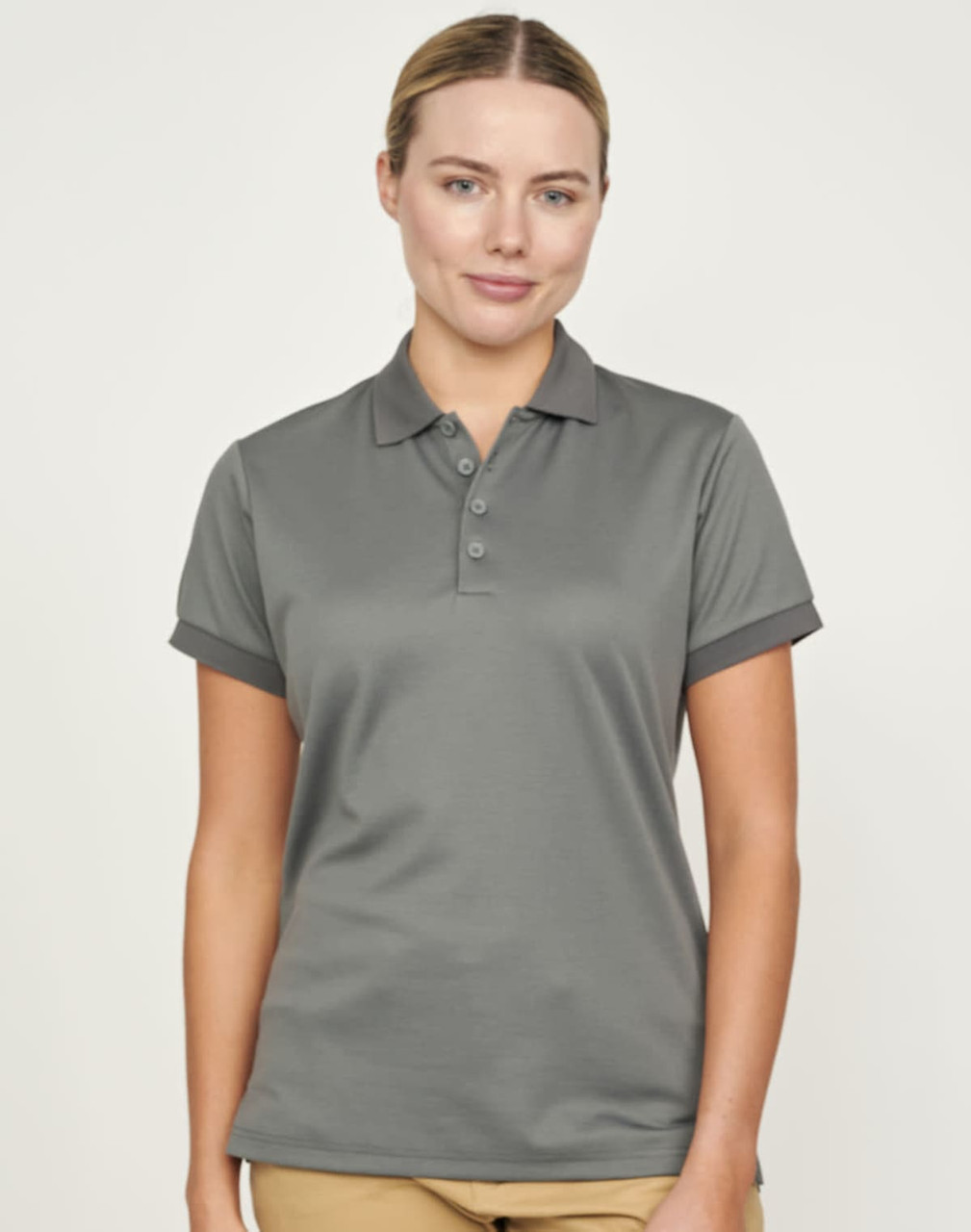 A ladies' short-sleeve polo shirt in grey with a logo, featuring a classic collar and rolled sleeves.