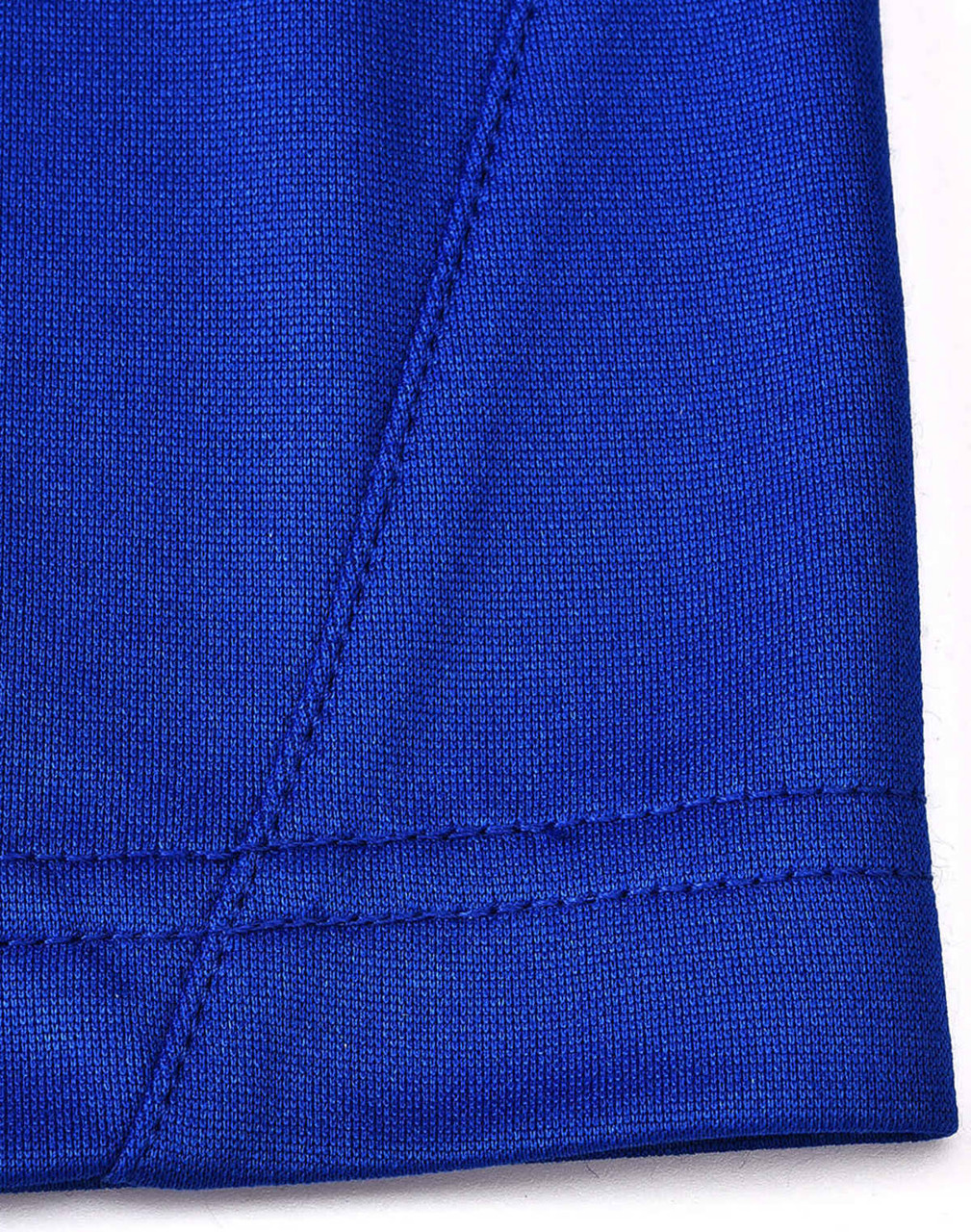 A close-up of a blue polo shirt featuring contrast stitching and a tag with a logo.