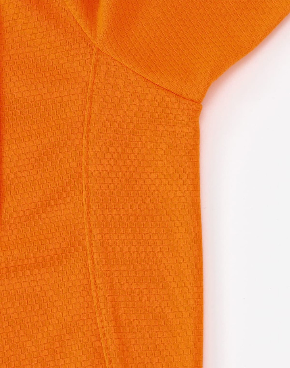 An orange short-sleeved polo shirt made from bamboo charcoal material, featuring a subtle textured pattern.