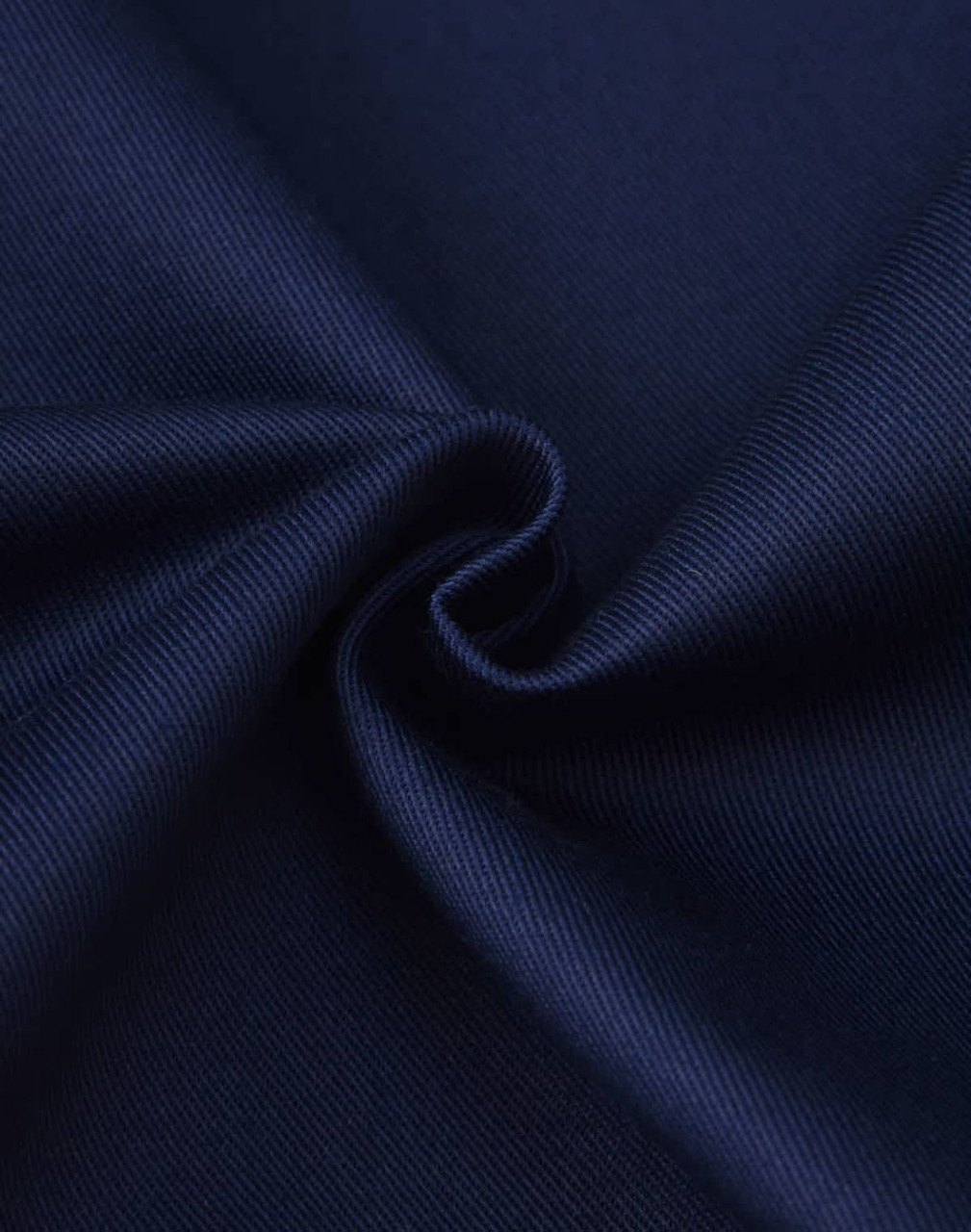A close-up of dark navy fabric featuring a smooth, textured weave, ideal for cargo work shorts.