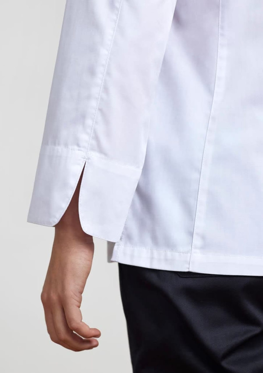 A white long sleeve chef jacket featuring split cuffs and a sleek design. It has branding on the fabric.
