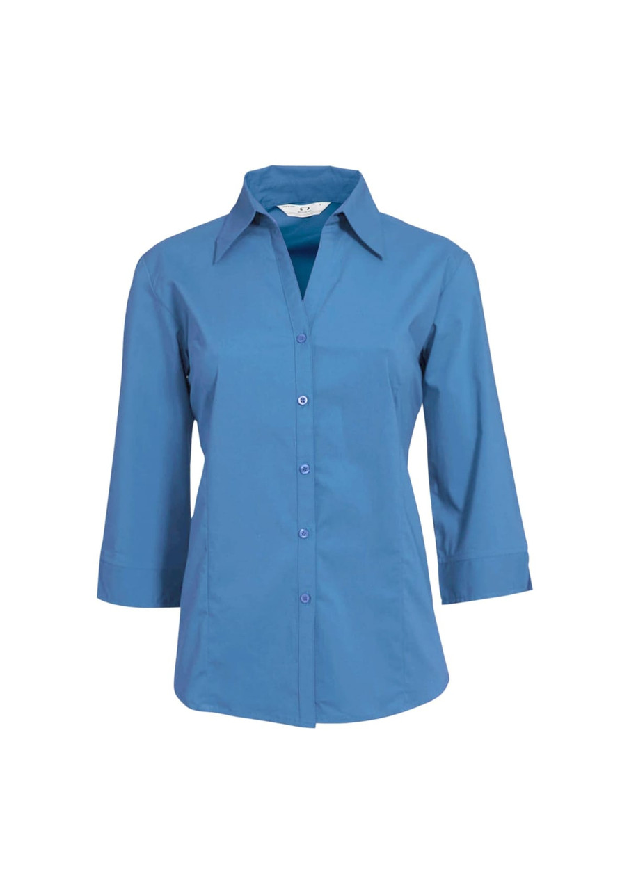 A women's button-up shirt in a vibrant blue with 3/4 sleeves and a collar. The shirt features a branding logo.