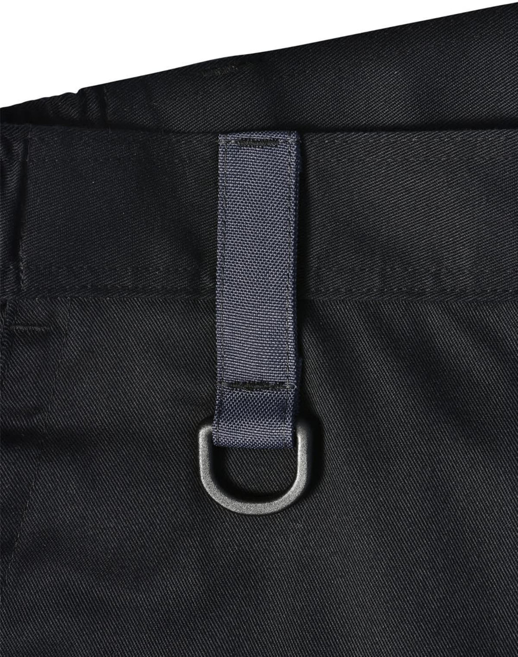 A close-up of a black unisex utility stretch cargo work pant featuring a fabric loop and metal ring detail.
