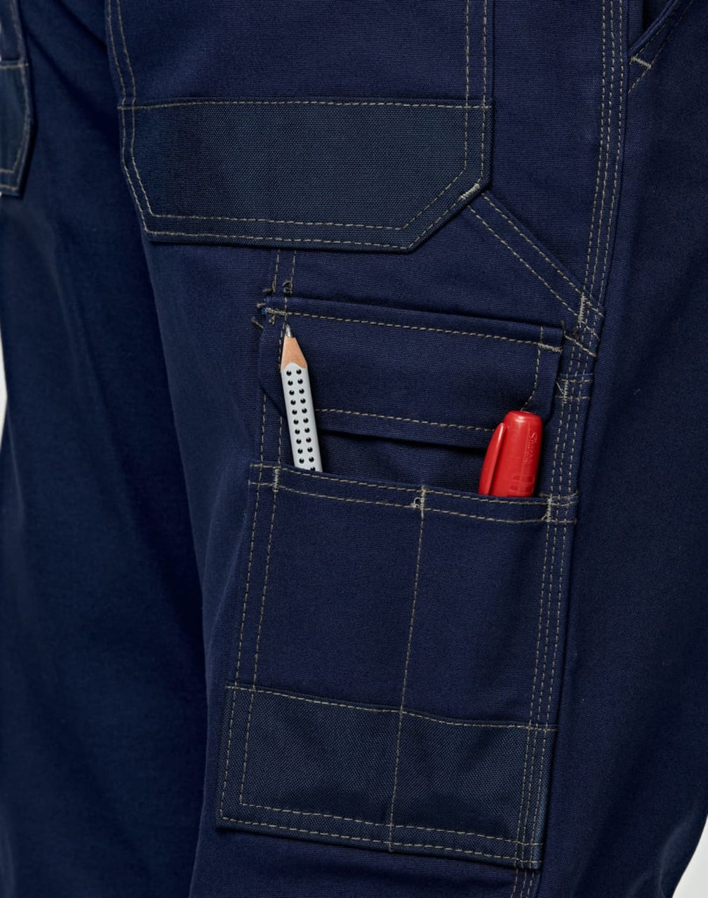 Light weight semi-fitted Cordura work pants in navy, featuring pockets with a pencil and marker visible. Includes a logo.