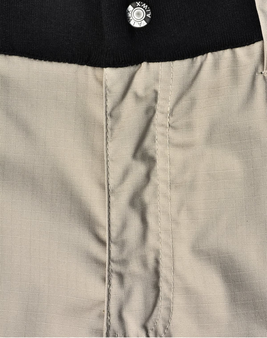 Rip-stop poly/cotton stretch work shorts in beige, featuring a black waistband and a button closure.