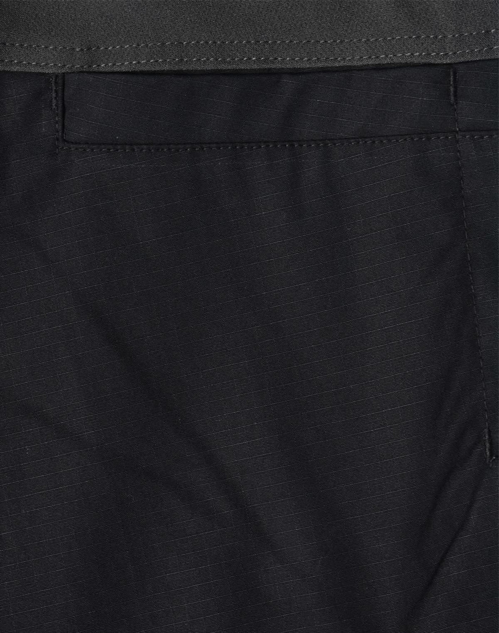 Black rip-stop poly/cotton stretch work pants with a subtle textured pattern and a pocket detail.