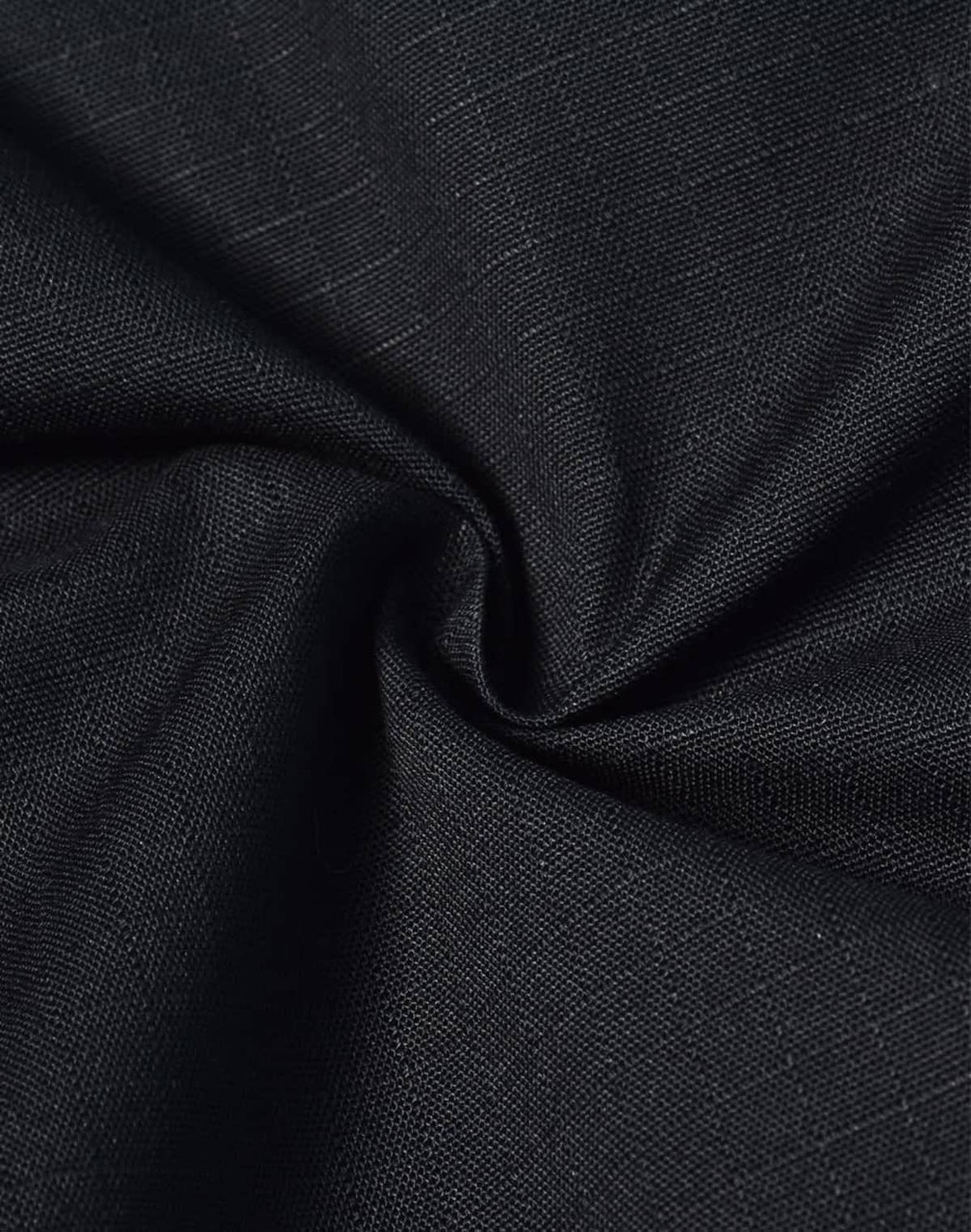 A close-up of black rip-stop poly/cotton fabric, showcasing its textured weave and durable quality.