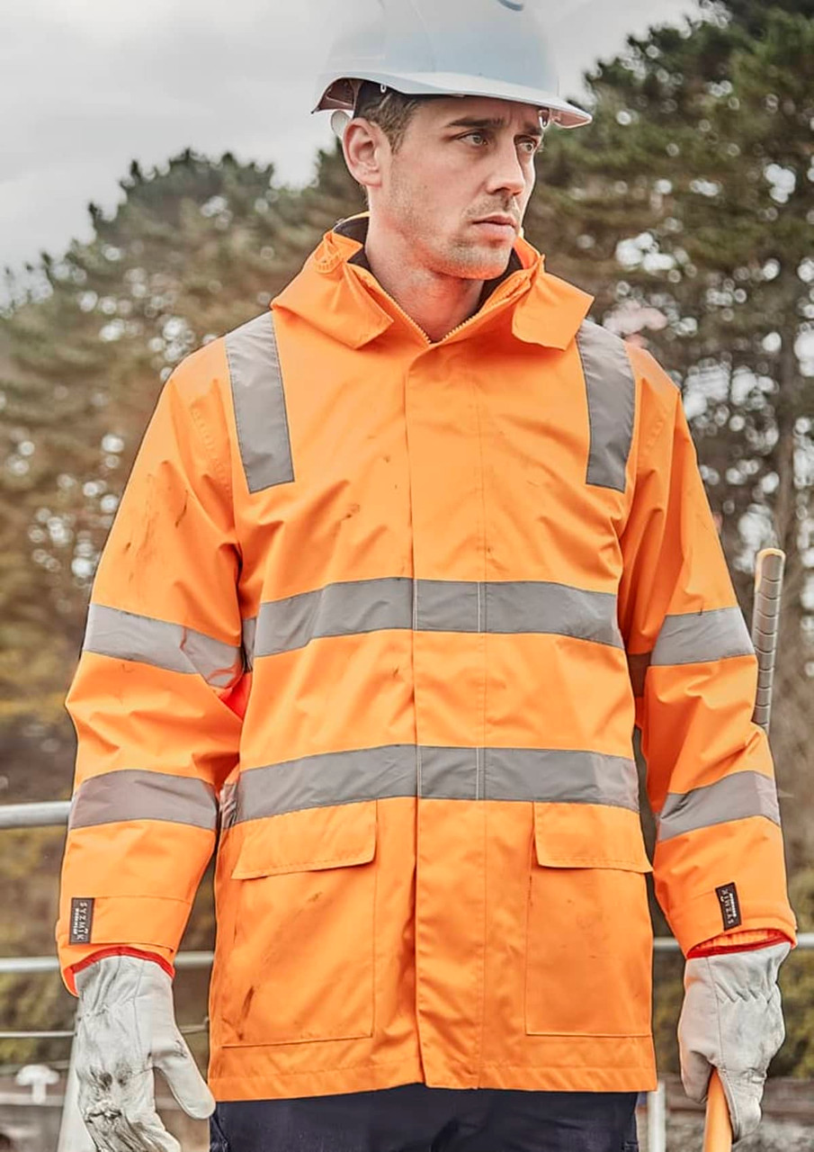 A waterproof unisex jacket in bright orange with reflective strips, designed for workwear, featuring a logo.