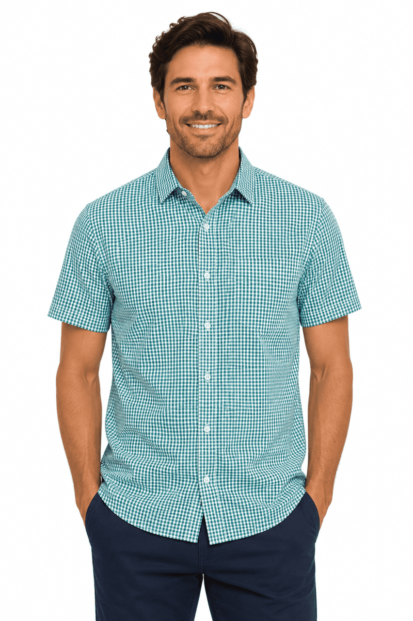 A short sleeve button-up shirt in a turquoise check pattern, featuring a logo and a relaxed fit.