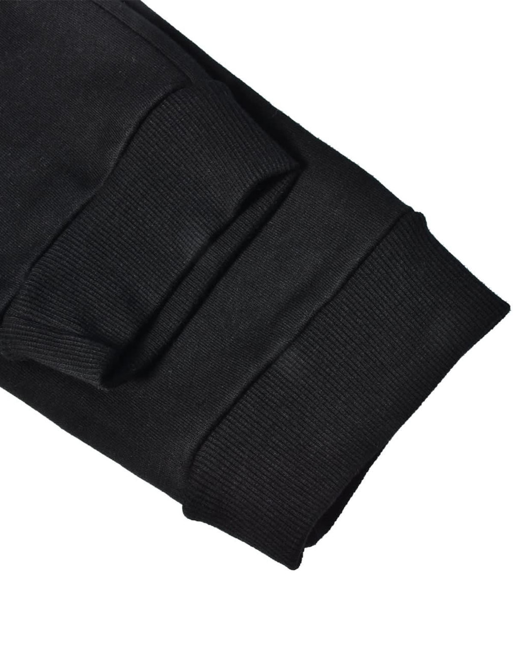 Black poly/cotton terry sweat pants with ribbed cuffs and a logo. Suitable for casual comfort.