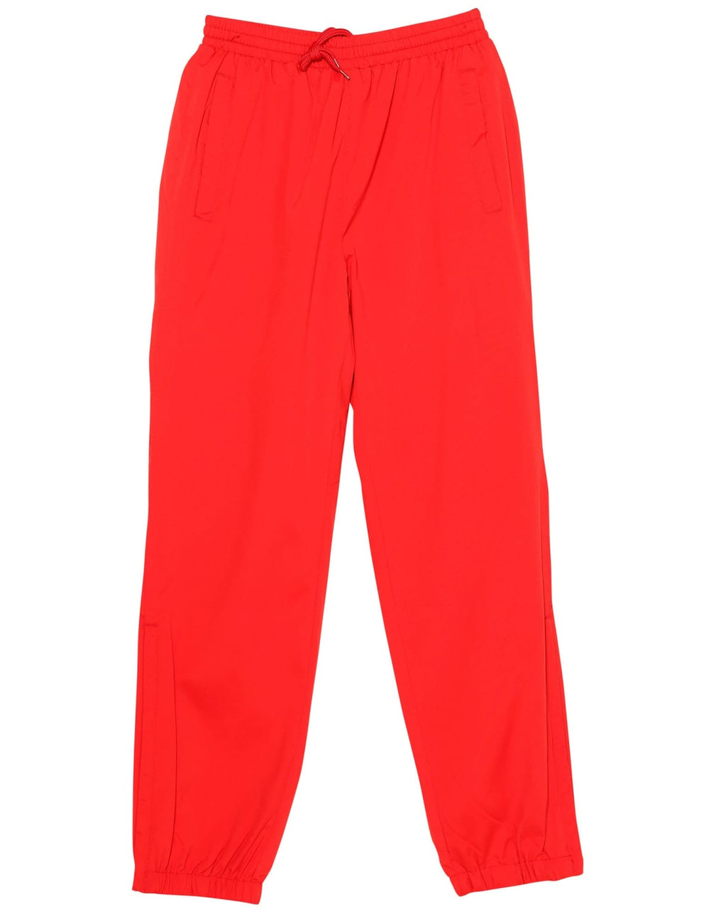 Bright red kids' warm-up track pants with an elastic waistband and pockets. Features a logo on the side.