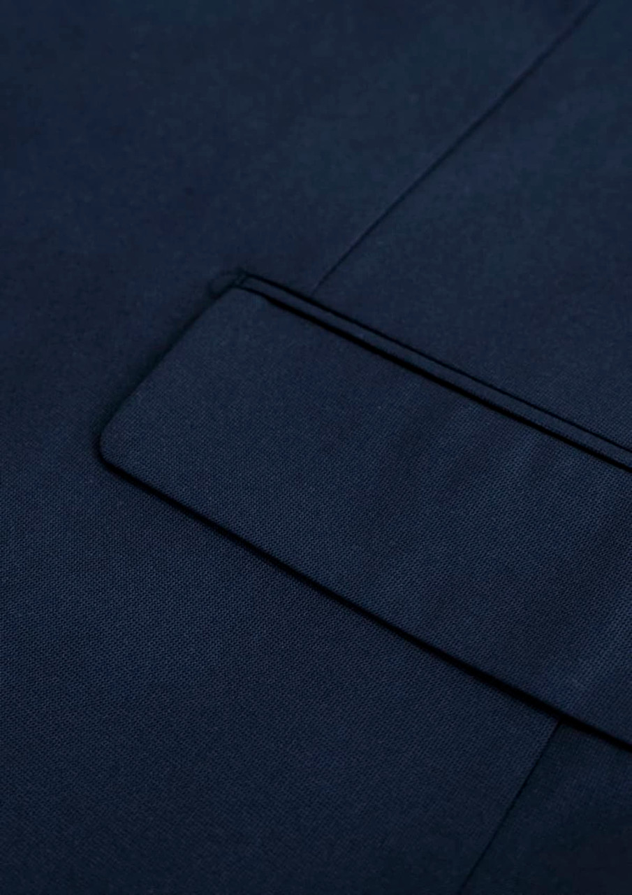 A navy blue men's jacket with a smooth texture and a detailed lapel. Features a branding logo.