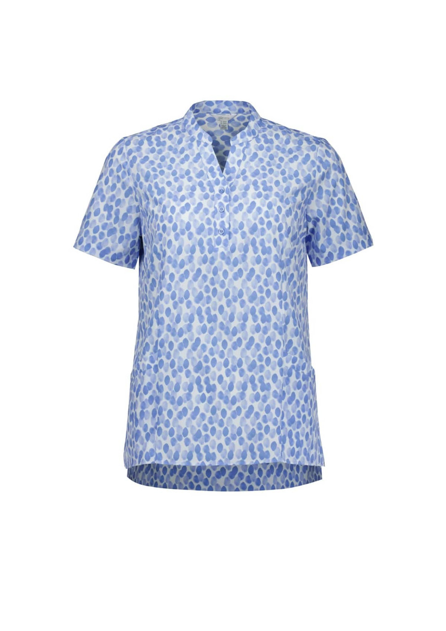 A blue and white tunic featuring a stardust print, with a v-neck and short sleeves. It has a branding logo.