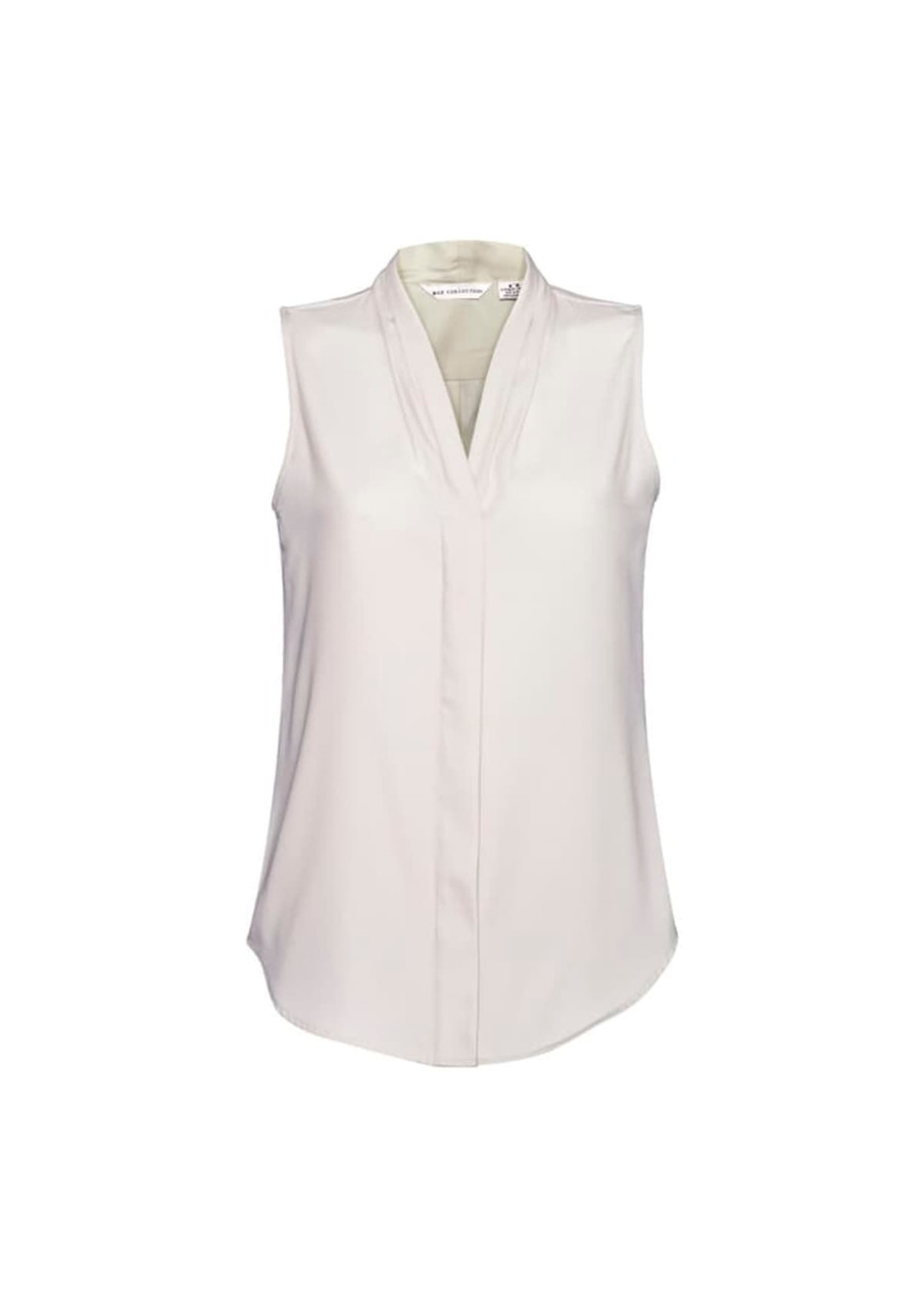 A sleeveless, light cream women's top with a v-neck and soft fabric. Features a branding logo.