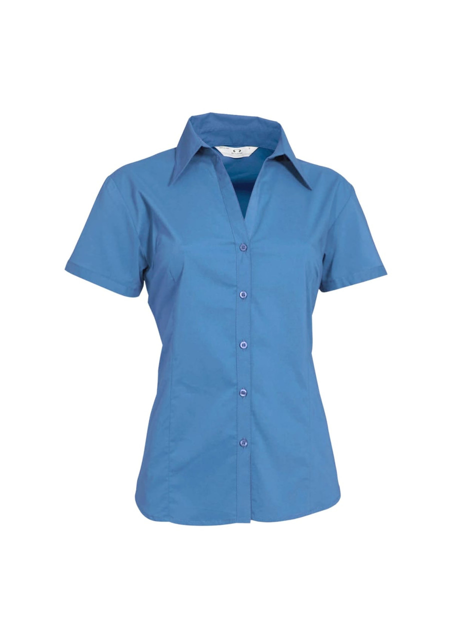 A women's short sleeve button-up shirt in light blue, featuring a collared neckline and buttons down the front.