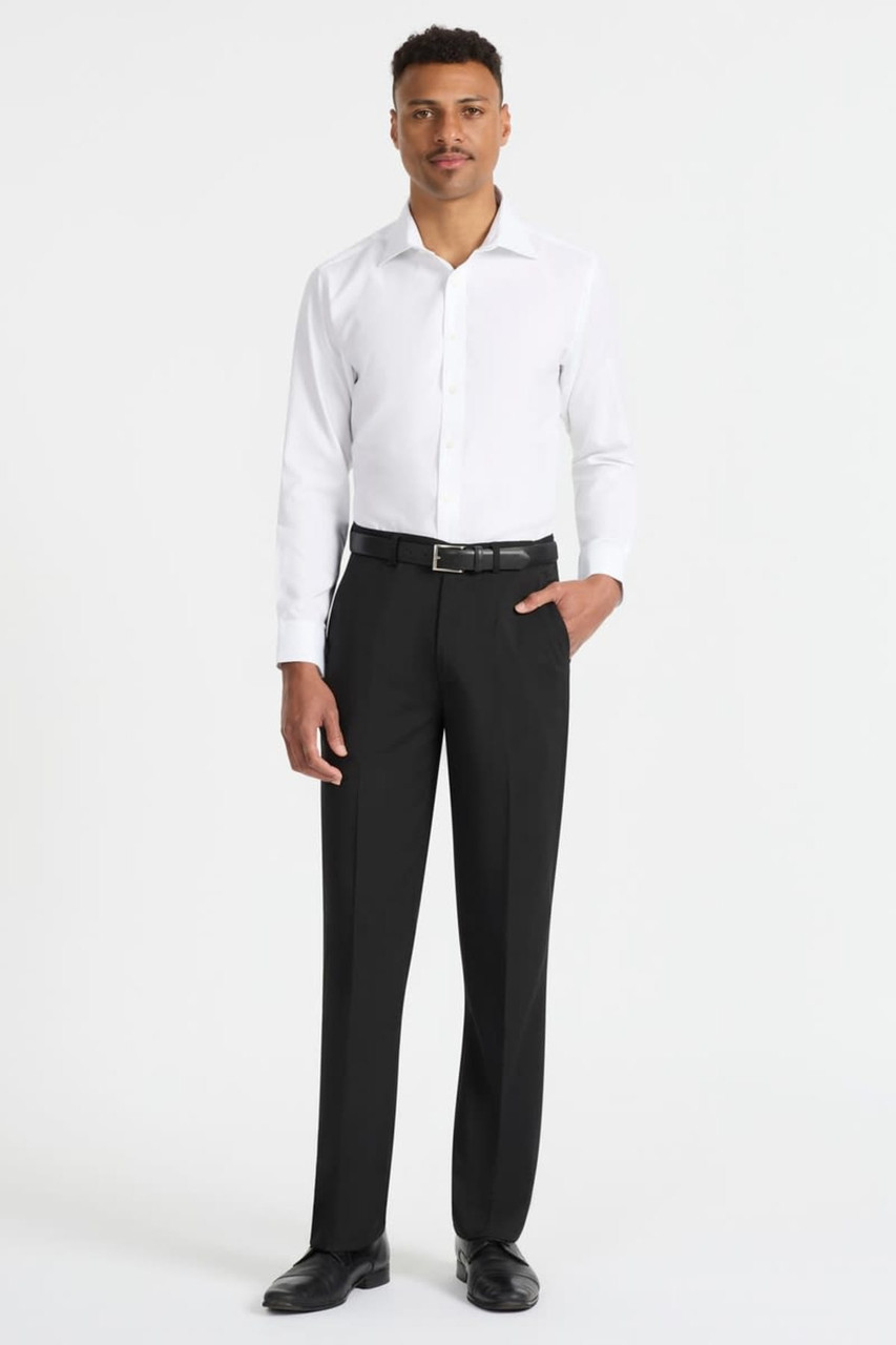 A man wearing a white long sleeve button-up shirt paired with black trousers and shoes, showcasing a sleek look.