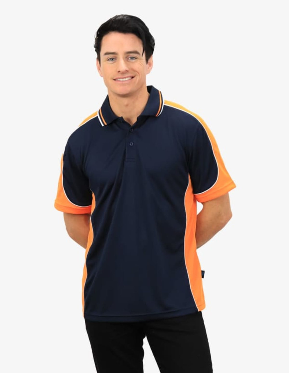 A navy and orange polo shirt with a logo, worn by a man posing on a plain background.