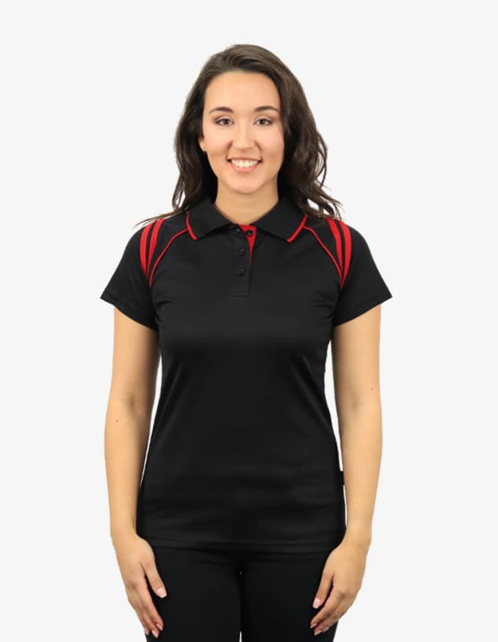 A black polo shirt with red accents, featuring a collar and a logo. Model wearing the shirt is smiling.