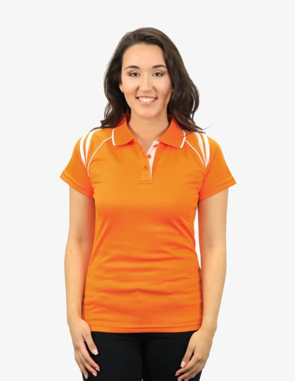 An orange polo shirt featuring white accents and a logo. Model is smiling, standing against a plain background.
