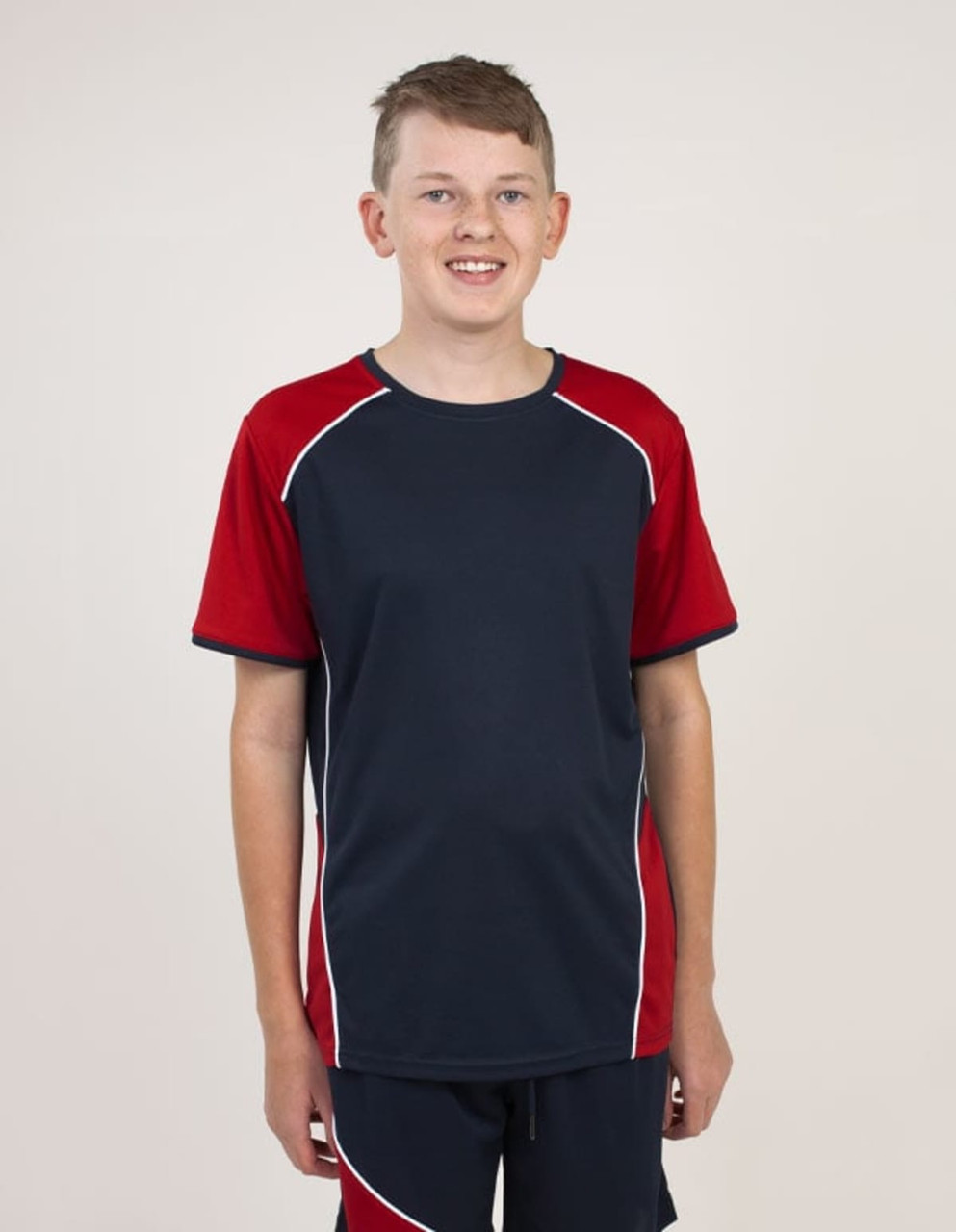 A T-shirt in navy blue and red with contrasting white stitching, featuring a logo on the front.