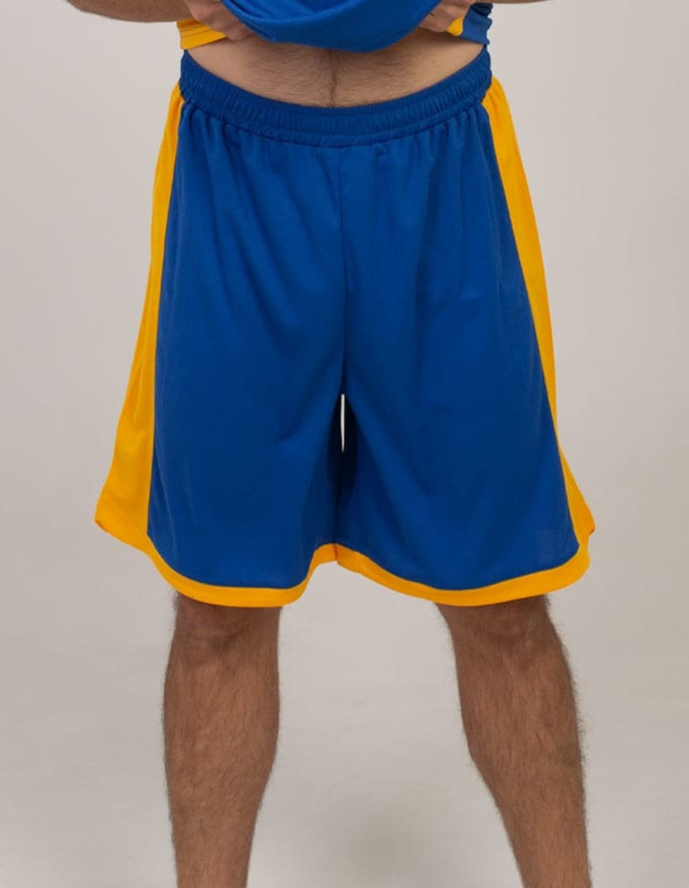 Blue sports shorts with yellow side panels and an elastic waistband, featuring a logo on the front.