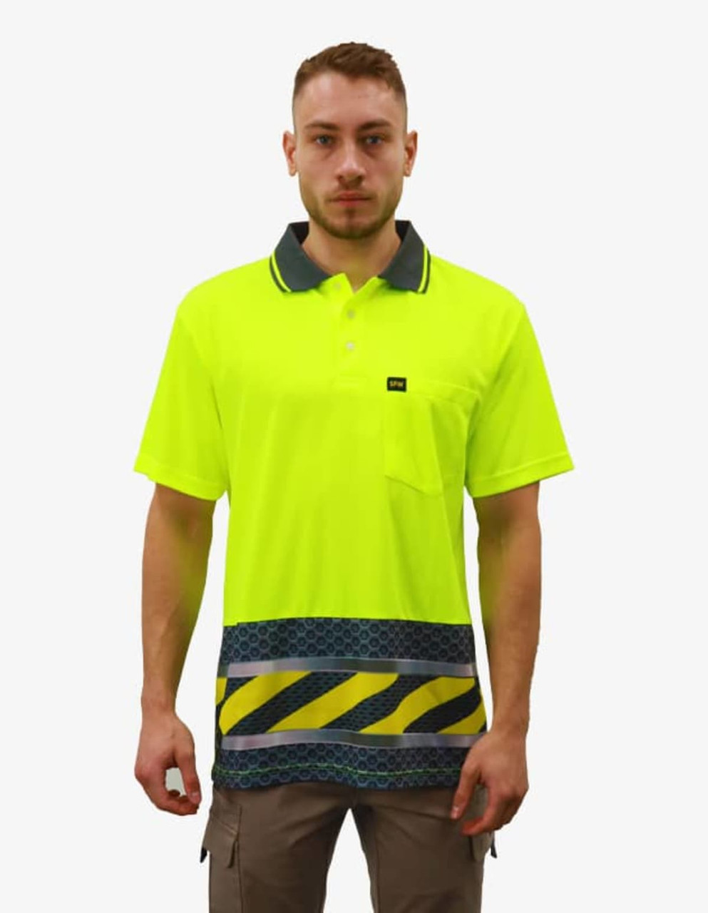 A bright yellow polo shirt featuring a patterned lower section and a pocket, with a collar and branding detail.