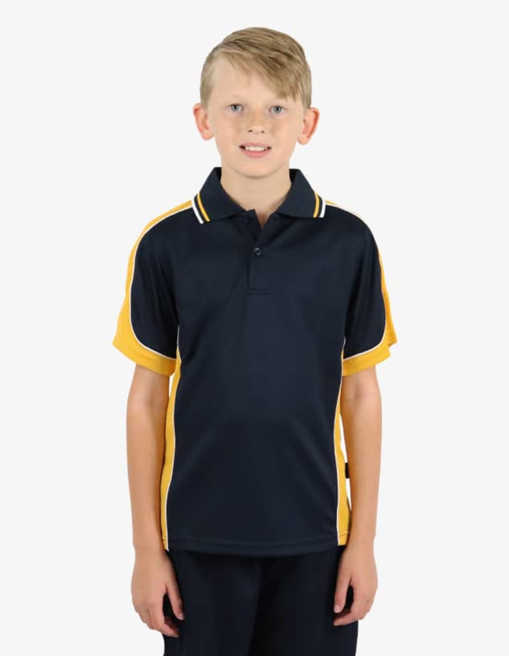A boy is wearing a navy blue polo shirt with yellow accents and a logo on the chest.