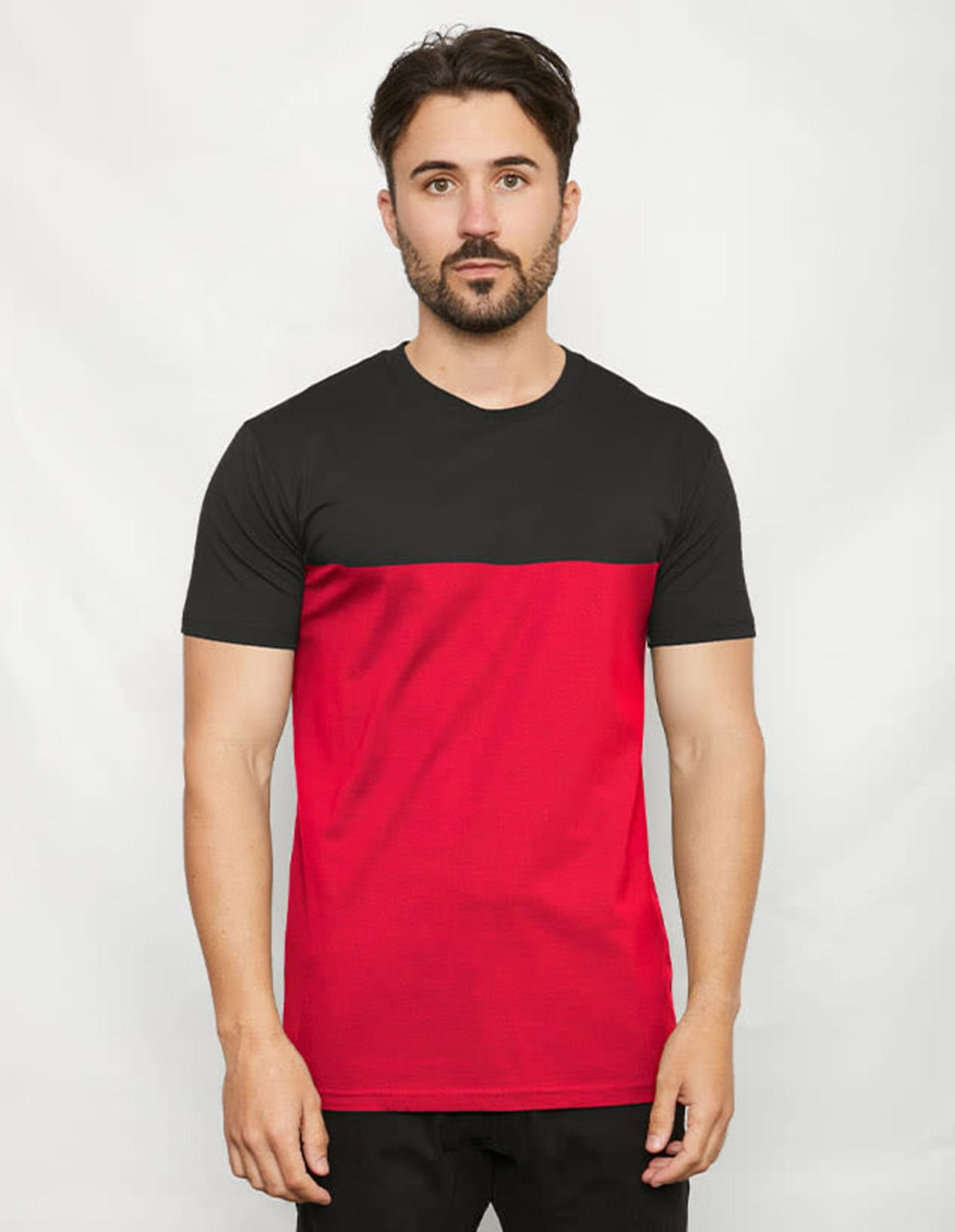 A two-toned T-shirt featuring a black top half and a red bottom half, with a model wearing it.