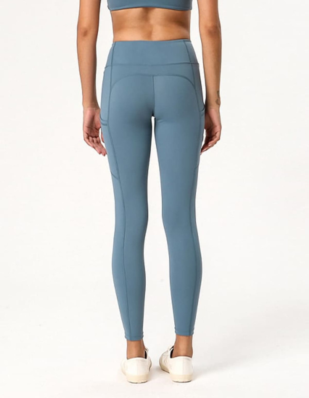 Ladies' leggings in a soft blue colour, featuring a fitted design with a high waistband and side detailing.