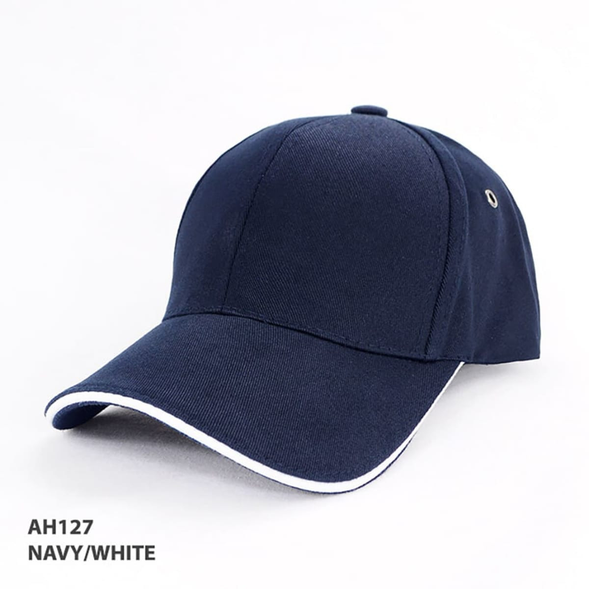 A navy and white organic cotton sandwich cap with a curved brim and logo detail.