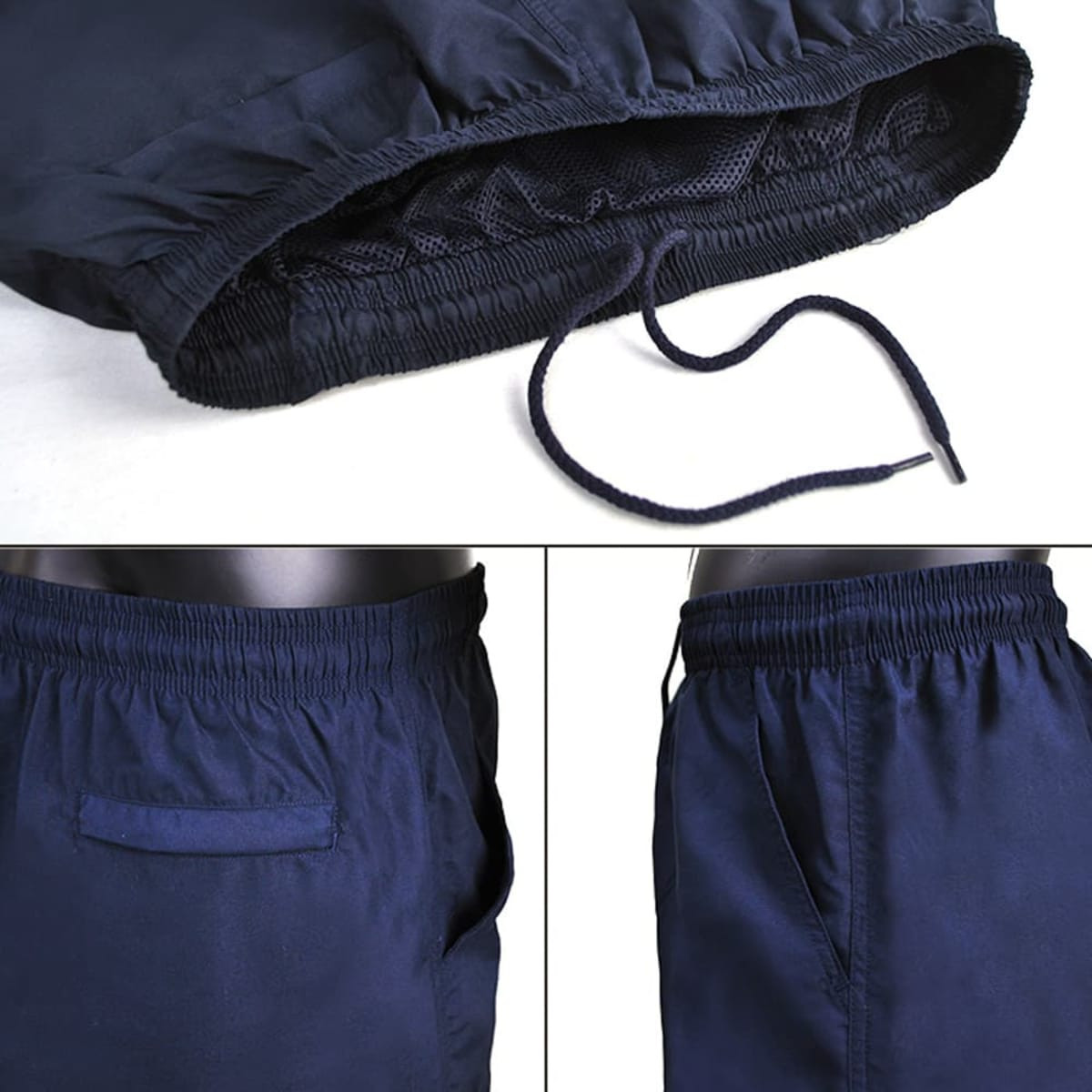 Navy sports shorts featuring an elastic waistband, drawstring, and side pockets. The shorts have a simple design with a logo.