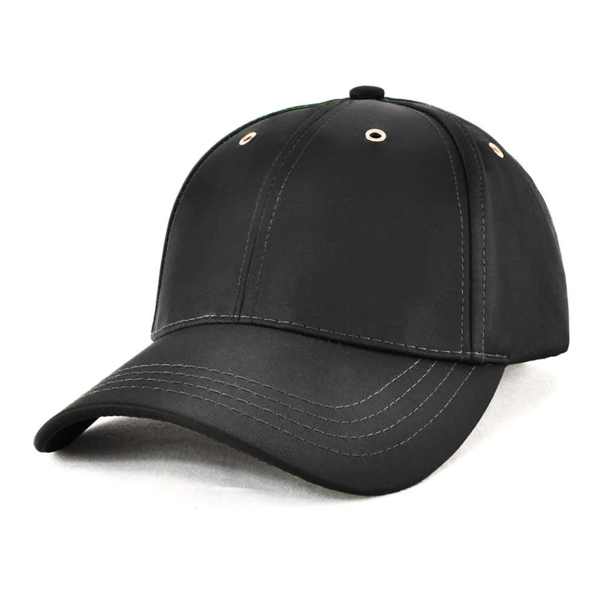 A black cap with a curved brim, featuring stitching details and ventilation holes. It has a logo on the front.