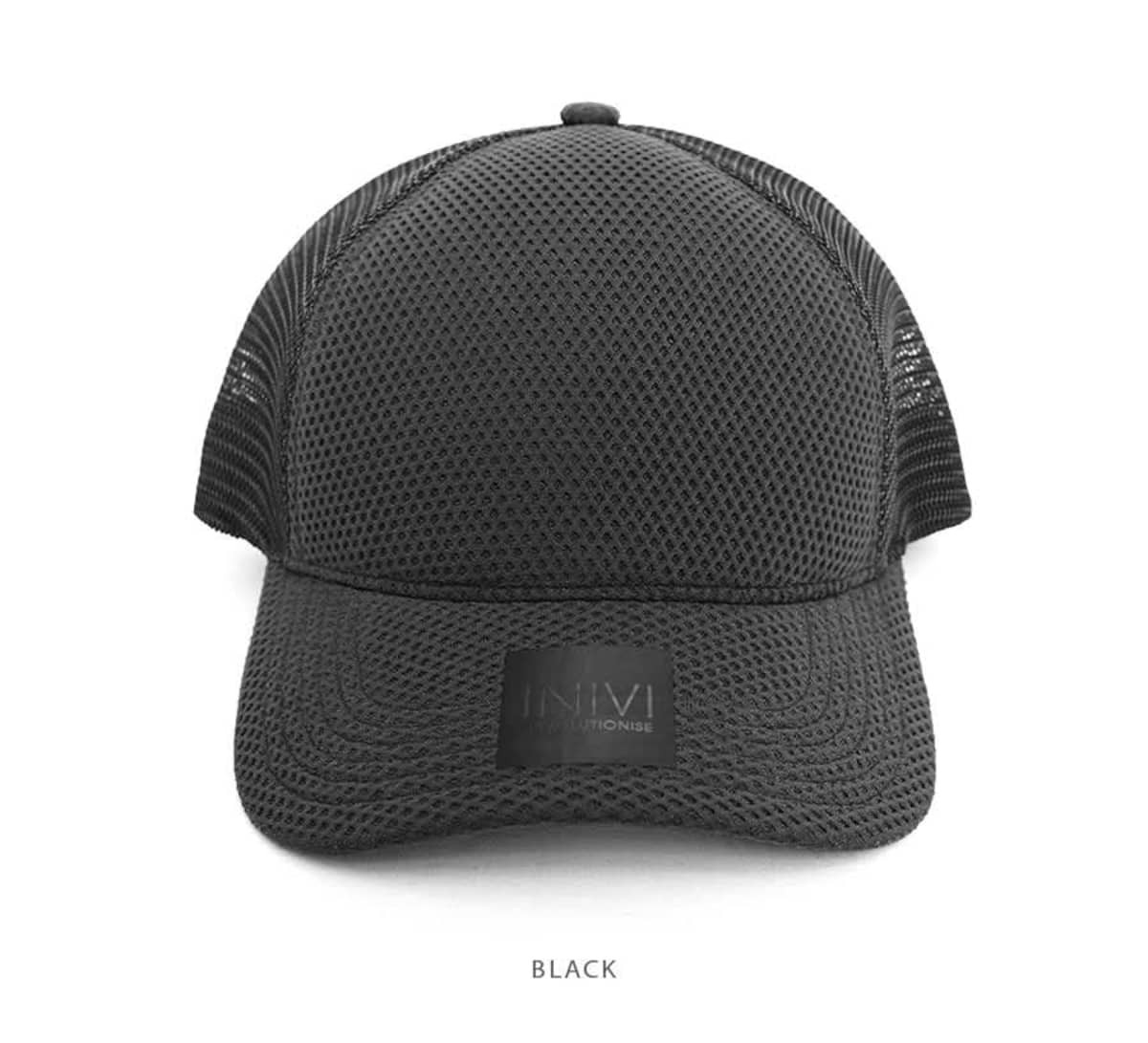 A black nylon/mesh cap with a structured front and a breathable mesh rear, featuring a logo on the front.