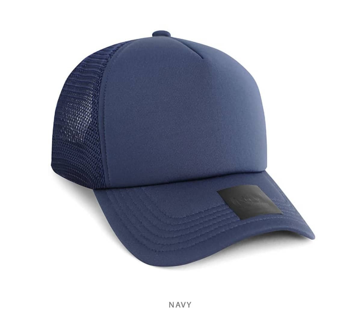 A navy trucker cap featuring a solid front and mesh panels at the back, with a logo on the front.