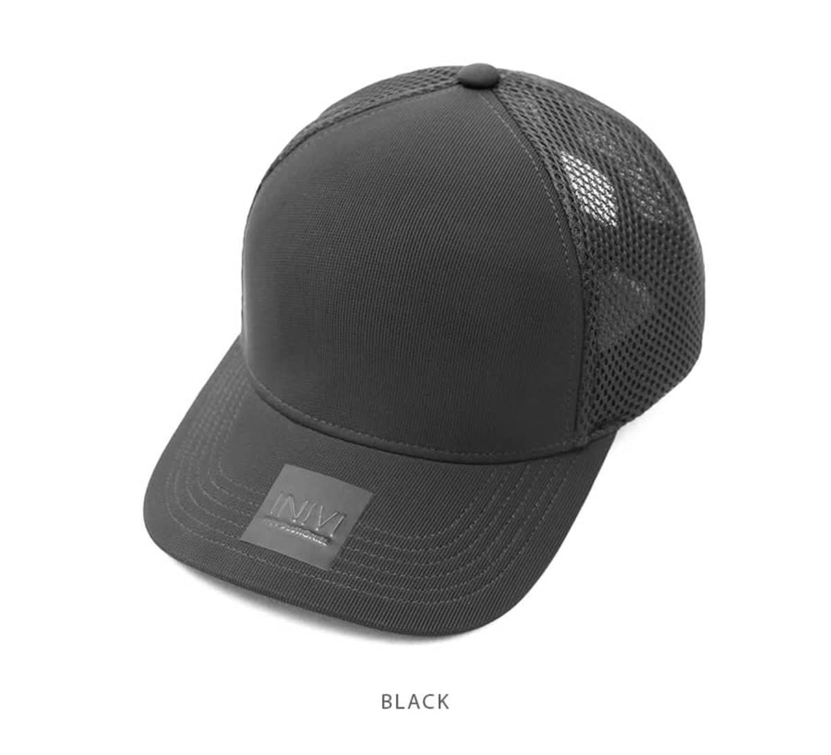A black polyester/mesh cap featuring a logo and a structured design with a mesh back.