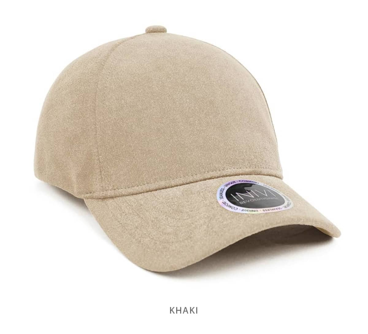 A khaki enzyme washed unstructured cap with a curved brim and a logo on the side.