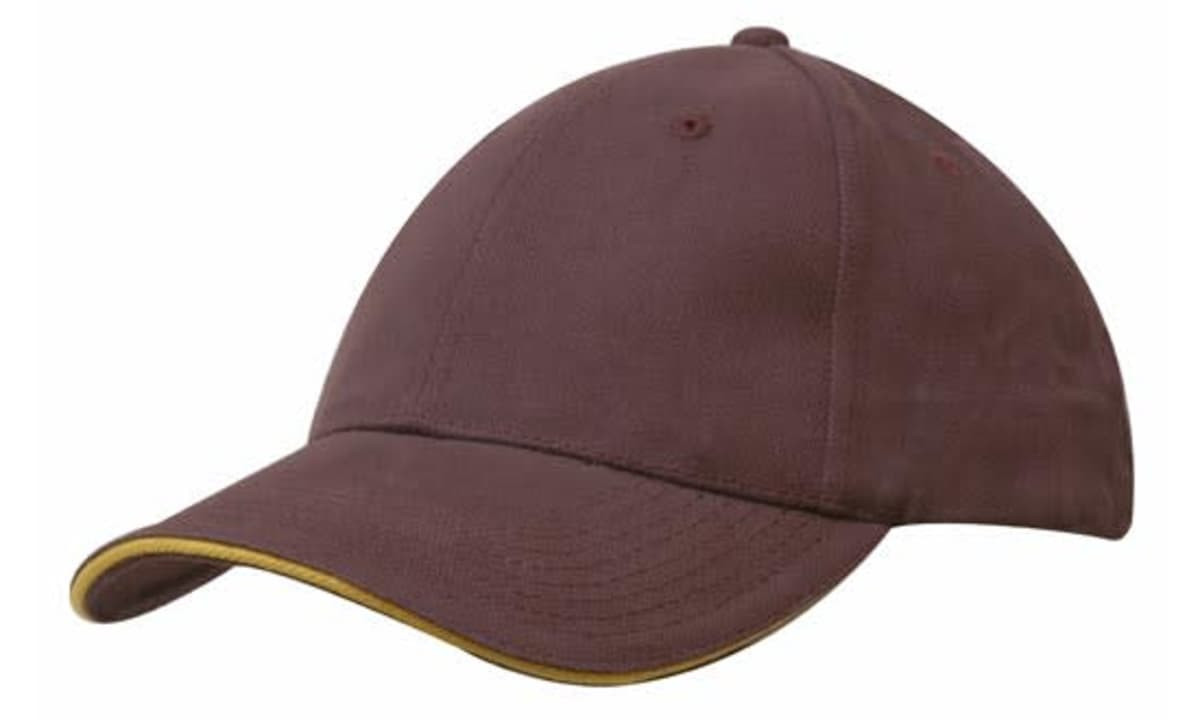 A brown cap with a sandwich trim in yellow, featuring a curved brim and a logo.