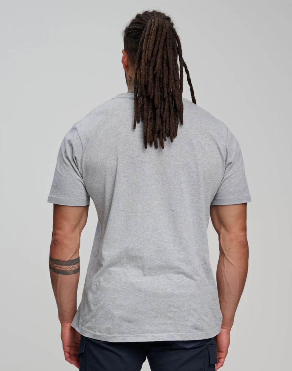 A grey premium cotton short sleeve t-shirt, viewed from the back, featuring a logo on the design.